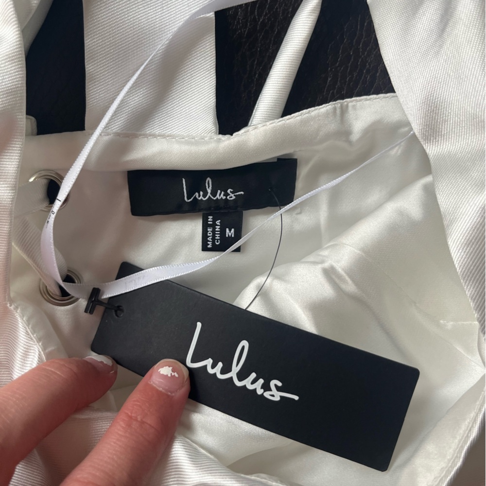 Coquettish White Lace-Up Bustier Top
Lulus - Picture 8 of 8